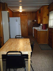Cabin 5 view from living room into dining & kitchen areas