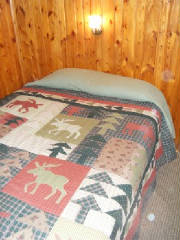 Cabin #8 offers 1 queen bedroom and 1 full/standard bedroom